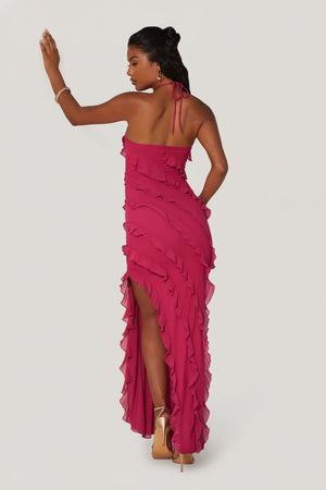 Oh Polly's Yarelis wearing the Calico Maxi Dress in Fuchsia Mesh fabric perfect for girls' night out