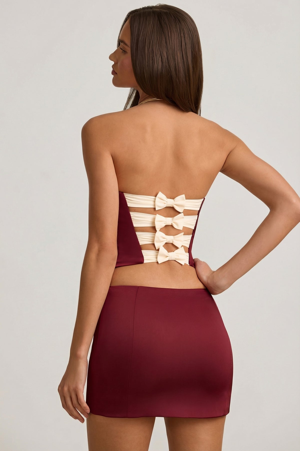 Satin Bow-Detail Low-Rise Mini Skirt in Wine Red