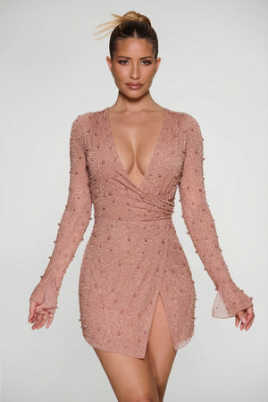 Oh Polly's Sierra Skye wearing the Chelsea Mini Dress in Beige Embellished fabric perfect for a night out