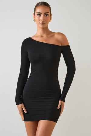 Oh Polly's Priscilla wearing the Fia Mini Dress in Black Modal fabric perfect for a night out