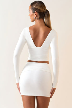 Oh Polly's Priscilla wearing the Harri Full Top in White Modal fabric perfect for rooftop parties