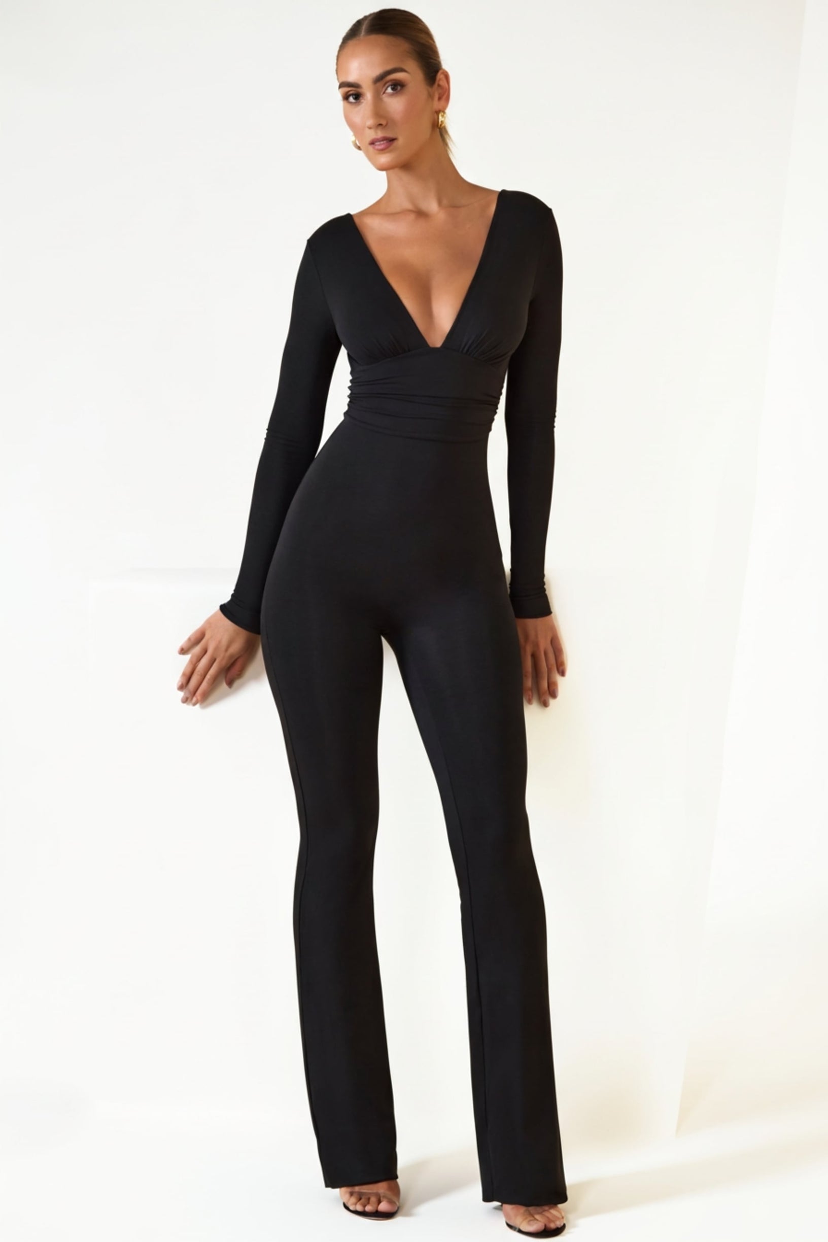 Modal Ruched Plunge Flared Jumpsuit in Black - 1
