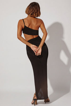 Oh Polly's Cristal wearing the Ishtar Maxi Dress in Black Textured Jersey fabric perfect for elegant evening events