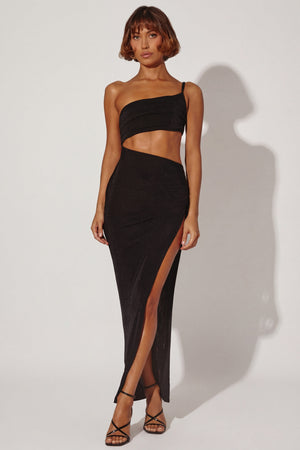 Oh Polly's Cristal wearing the Ishtar Maxi Dress in Black Textured Jersey fabric perfect for elegant evening events