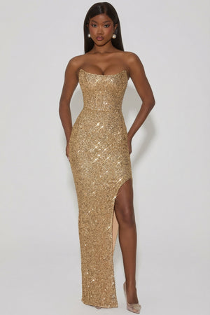 Oh Polly's Sevah wearing the Jasella Gown Length Dress in Gold Sequin fabric perfect for glamorous evening events
