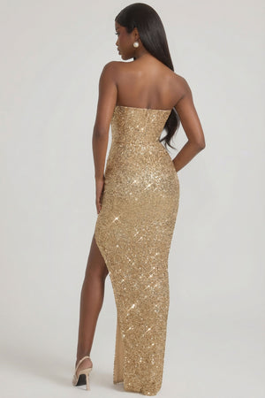 Oh Polly's Sevah wearing the Jasella Gown Length Dress in Gold Sequin fabric perfect for holiday parties