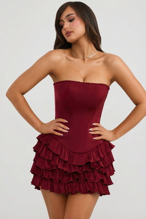 Oh Polly's Ella wearing the Juliet Mini Dress in Berry Red Satin fabric perfect for a romantic dinner date