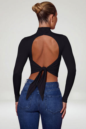 Oh Polly's Sierra Skye wearing the Karita Full Top in Black Slinky Jersey fabric perfect for a night out