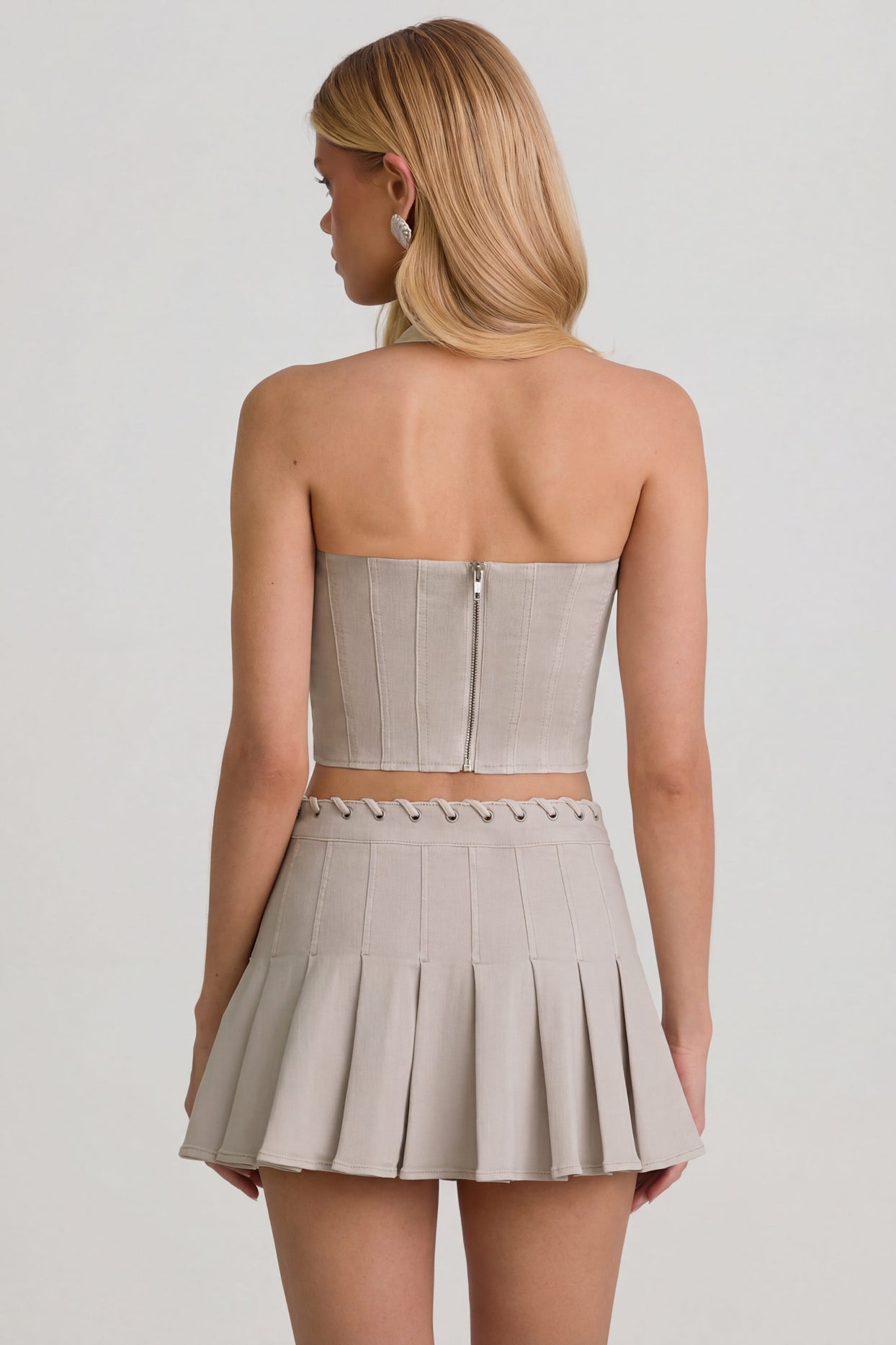 Low-Rise Pleated Mini Skirt in Ecru - 8