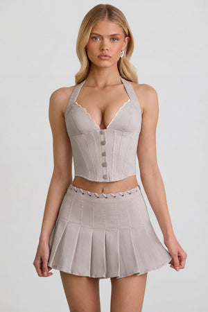 Oh Polly's Josey Anne wearing the Laika Mini Skirt in Ecru Denim fabric perfect for music festivals