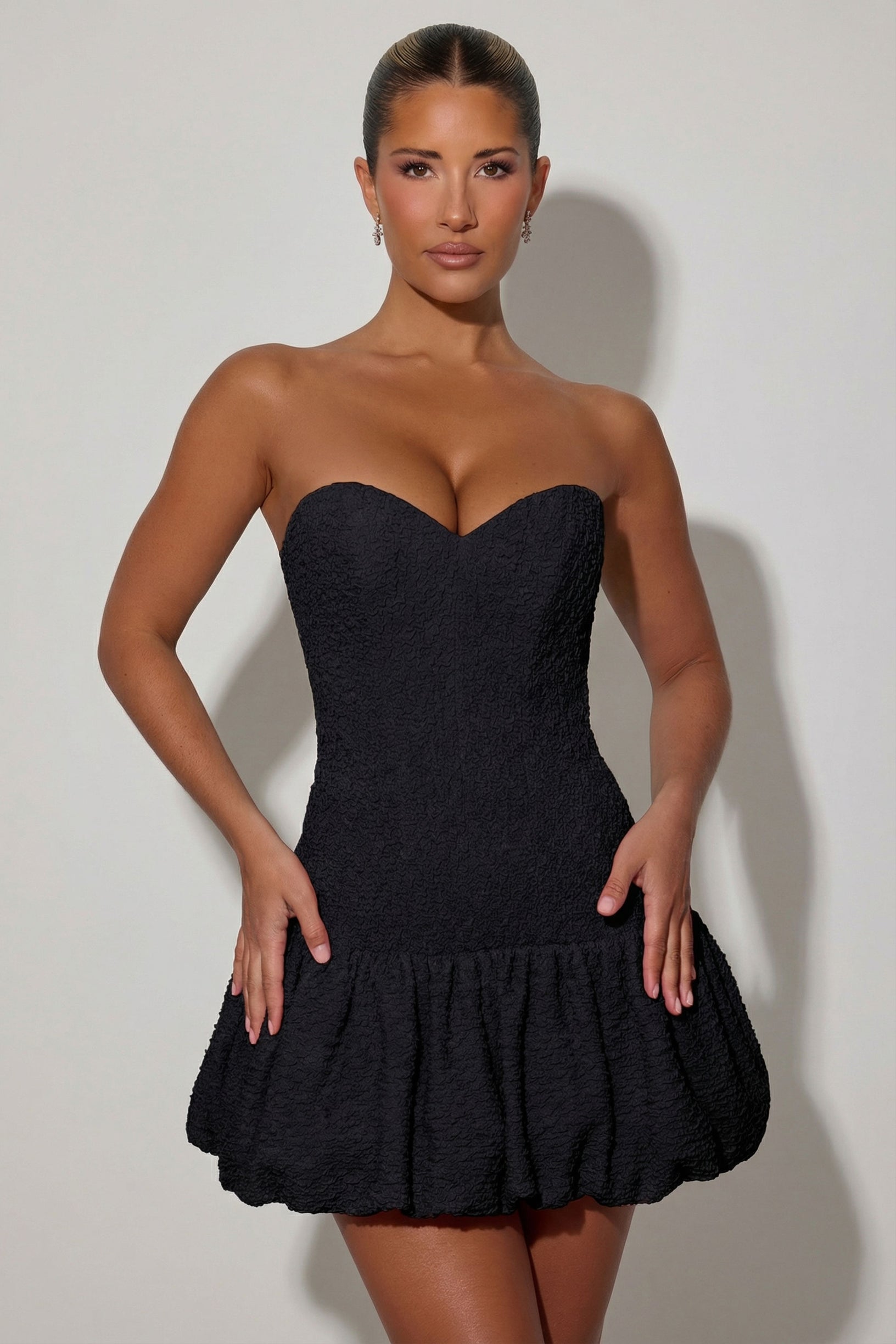 Cut-Out Bubble Hem Corset Mini Dress in Black - 1