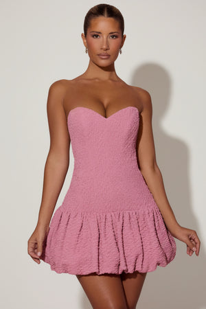 Cut-Out Bubble Hem Corset Mini Dress in Dusty Pink