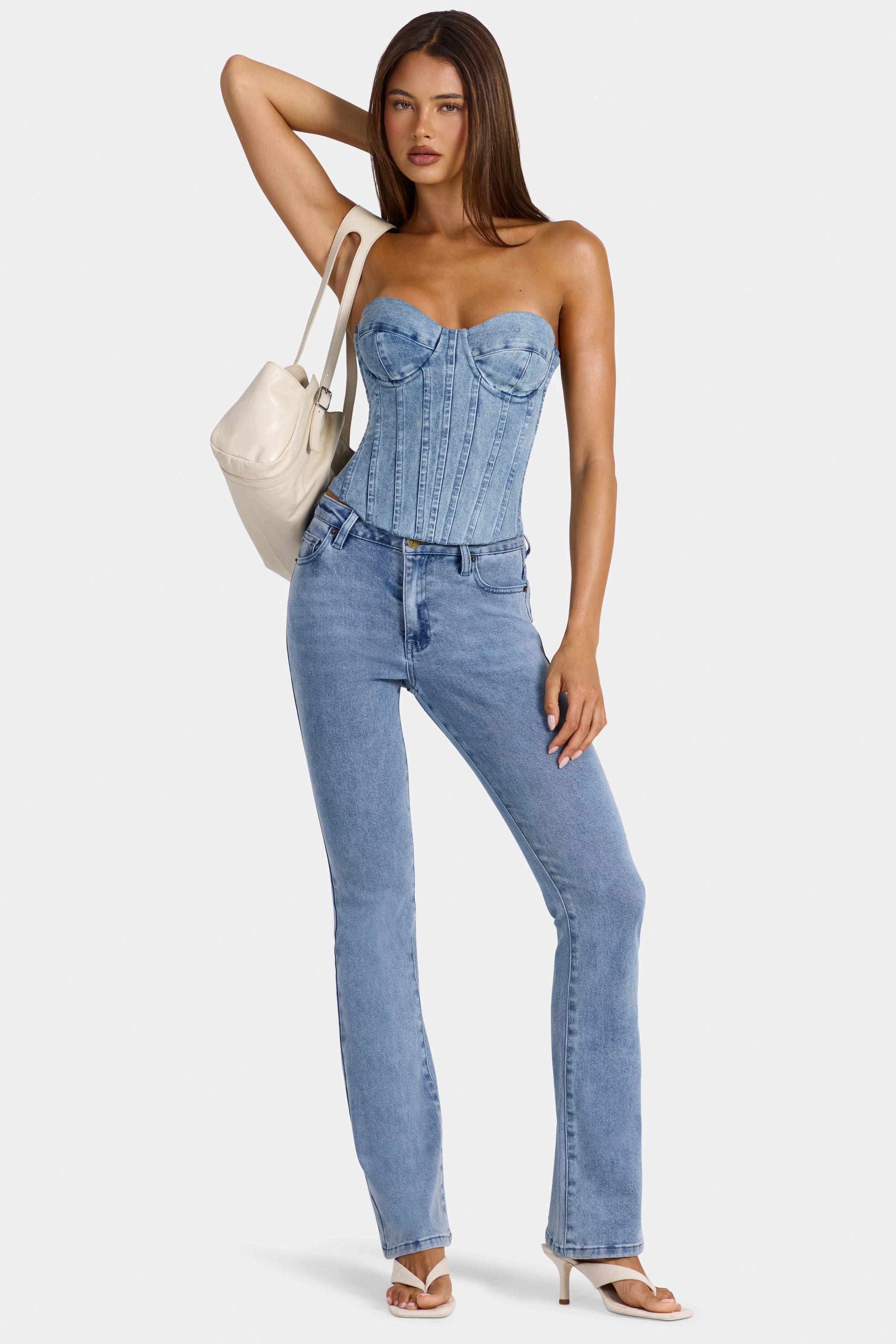 Low-Rise Flared Jeans  in Mid-Blue