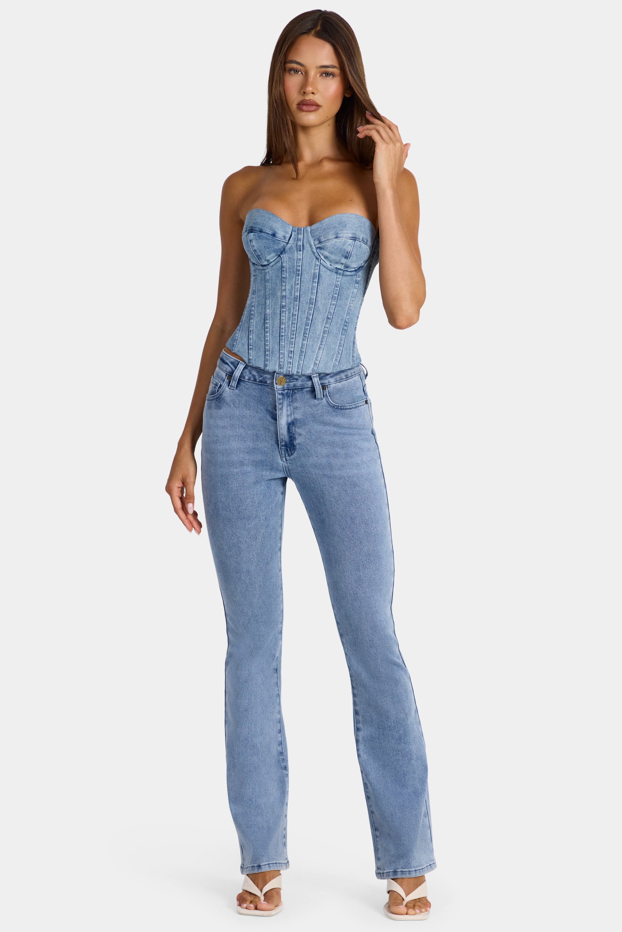 Low-Rise Flared Jeans  in Mid-Blue