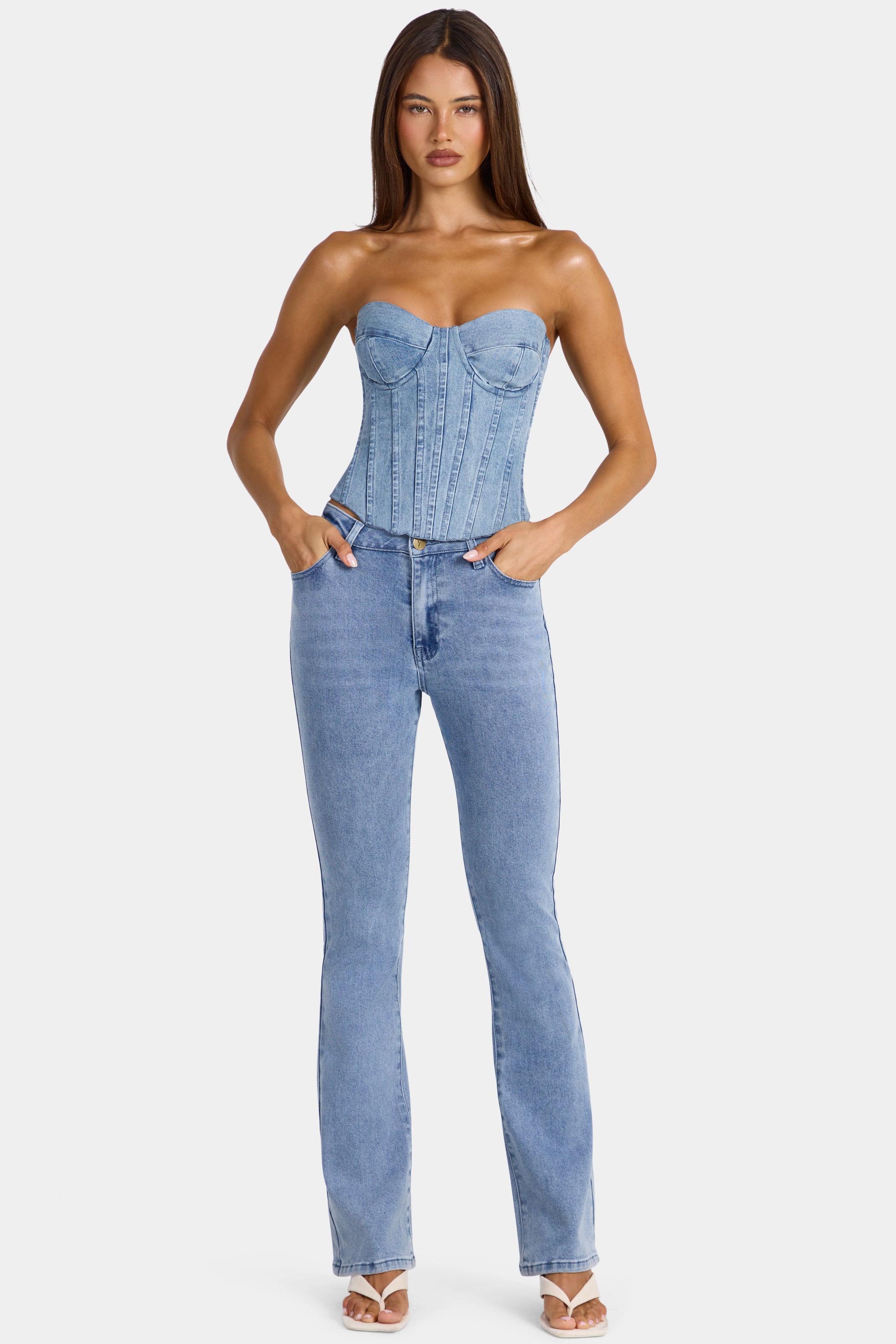 Low-Rise Flared Jeans  in Mid-Blue