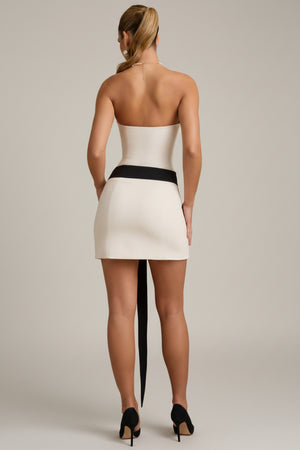 Oh Polly's Anna wearing the Neva Mini Dress in Ivory Satin fabric perfect for elegant date nights