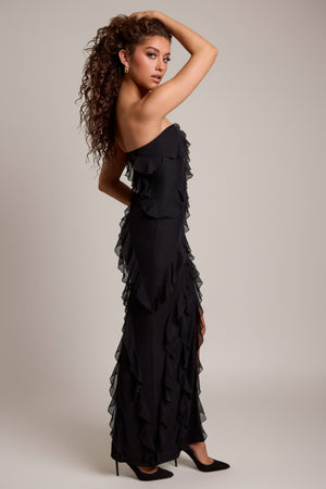 Oh Polly's Caroline wearing the Nevali Maxi Dress in Black Mesh fabric perfect for cocktail parties