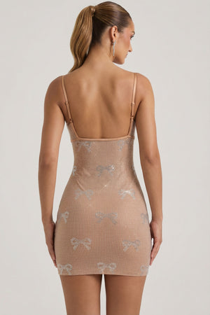 Oh Polly's Priscilla wearing the Olwen Mini Dress in Almond Square Hotfix fabric perfect for cocktail parties