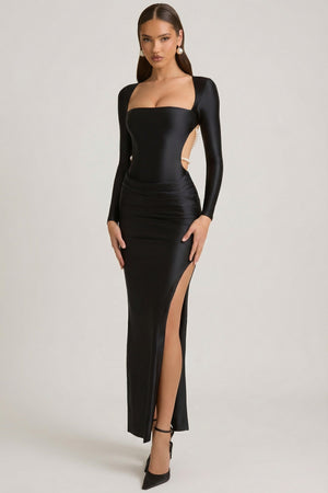 Oh Polly's Anna wearing the Quintessa Maxi Dress in Black Satin Jersey fabric perfect for luxury holiday parties