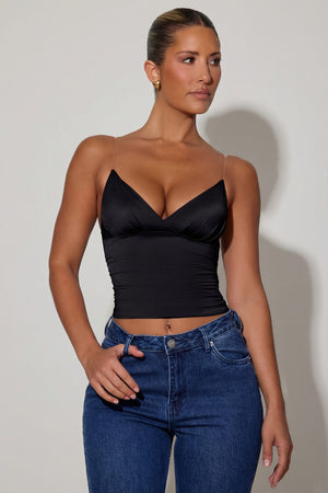 Oh Polly's Sierra Skye wearing the Raisa Corset Top in Black Slinky Jersey fabric perfect for cocktail events