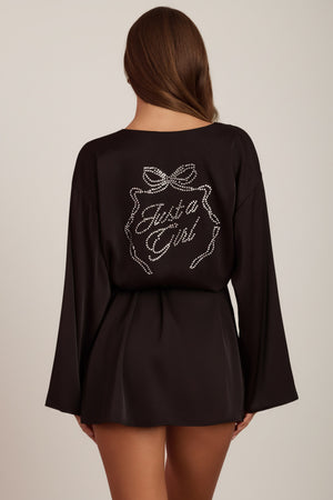 Oh Polly's Hayley wearing the Reina Cardigan in Black Satin fabric perfect for evening events