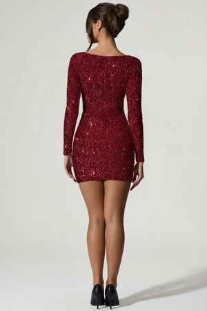Oh Polly's Anna wearing the Sephina Mini Dress in Red Micro Sequin fabric perfect for a night out