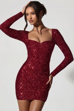 Oh Polly's Anna wearing the Sephina Mini Dress in Red Micro Sequin fabric perfect for birthday dinners