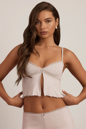 Oh Polly's Hayley wearing the Tana Crop Top in Cloud Grey Modal fabric perfect for rooftop evening drinks