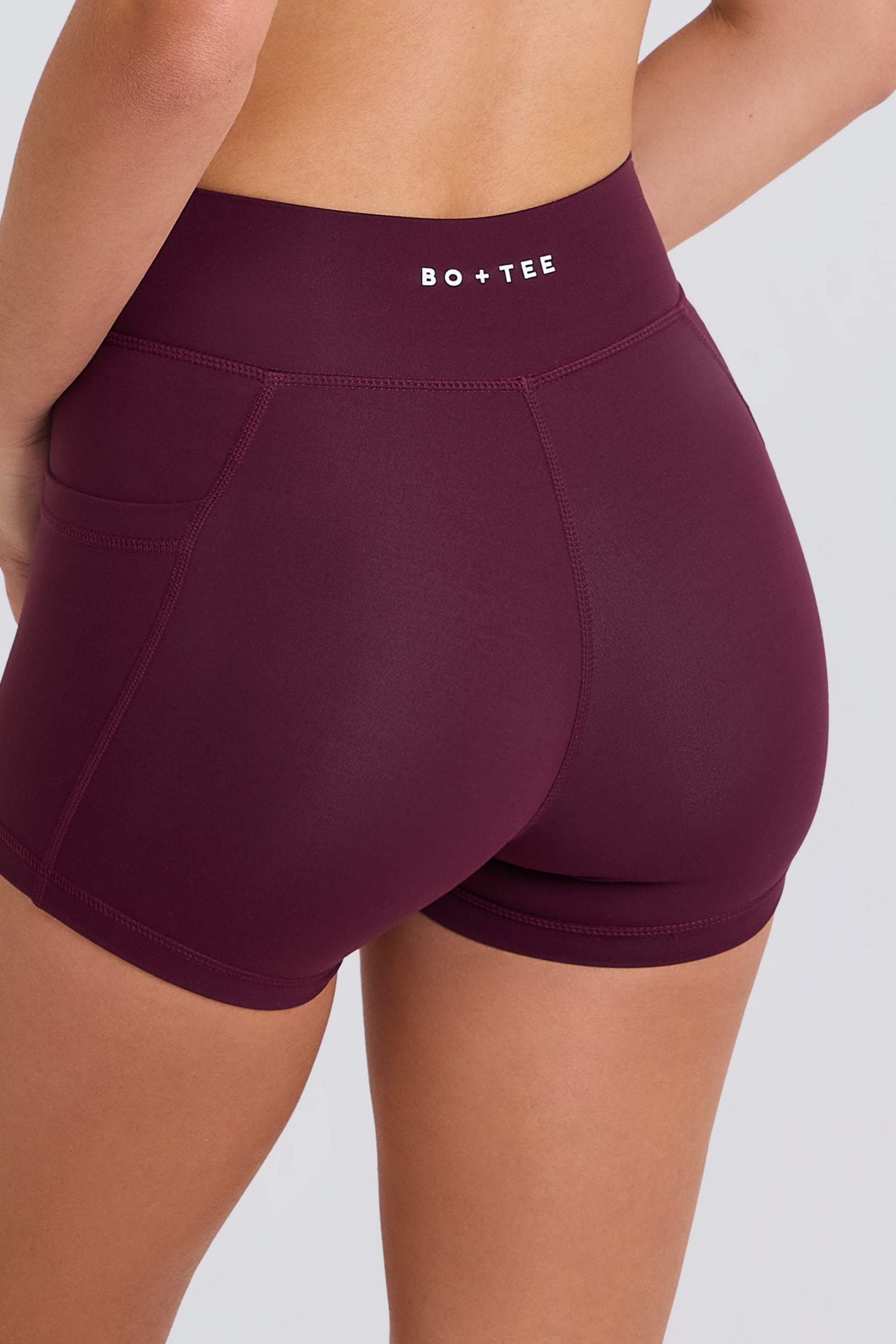 Soft Active V-Waist Pocket Mini Shorts in Burgundy - 2