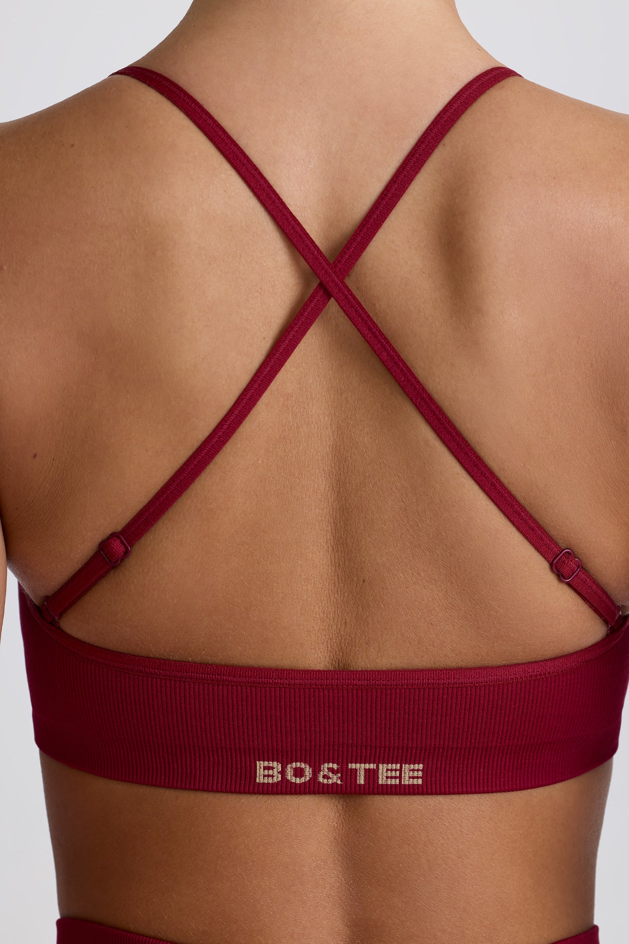 Super Sculpt Seamless Cross-Back Sports Bra in Burgundy - 6