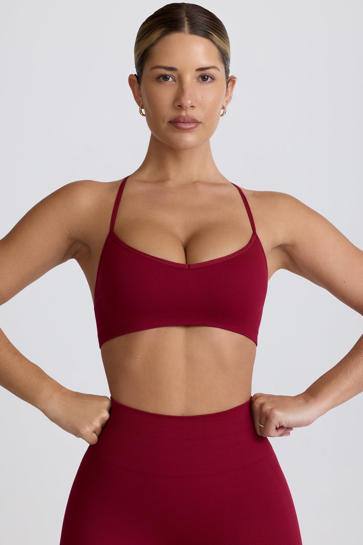 Super Sculpt Seamless Cross-Back Sports Bra in Burgundy - 7