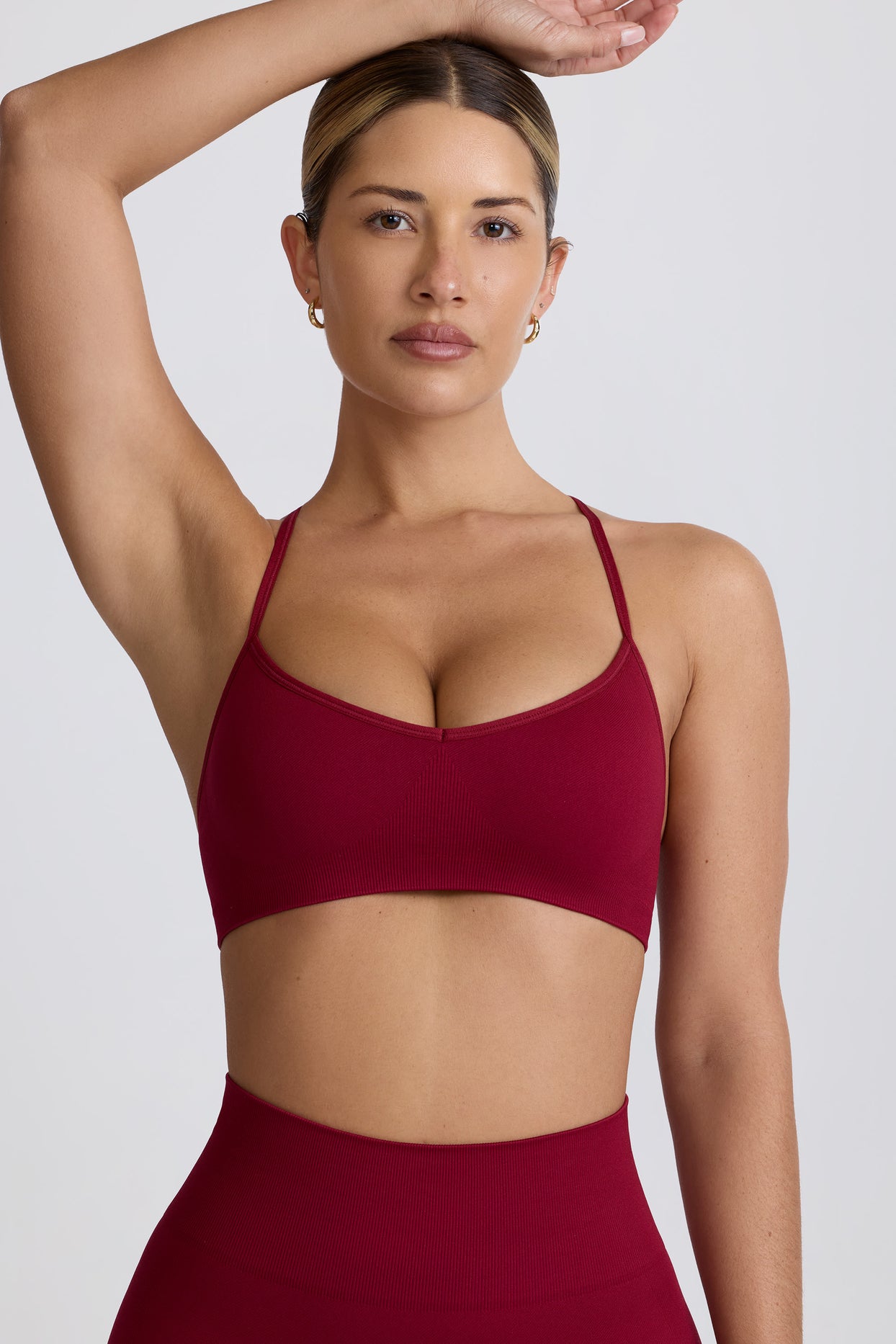 Super Sculpt Seamless Cross-Back Sports Bra in Burgundy - 9