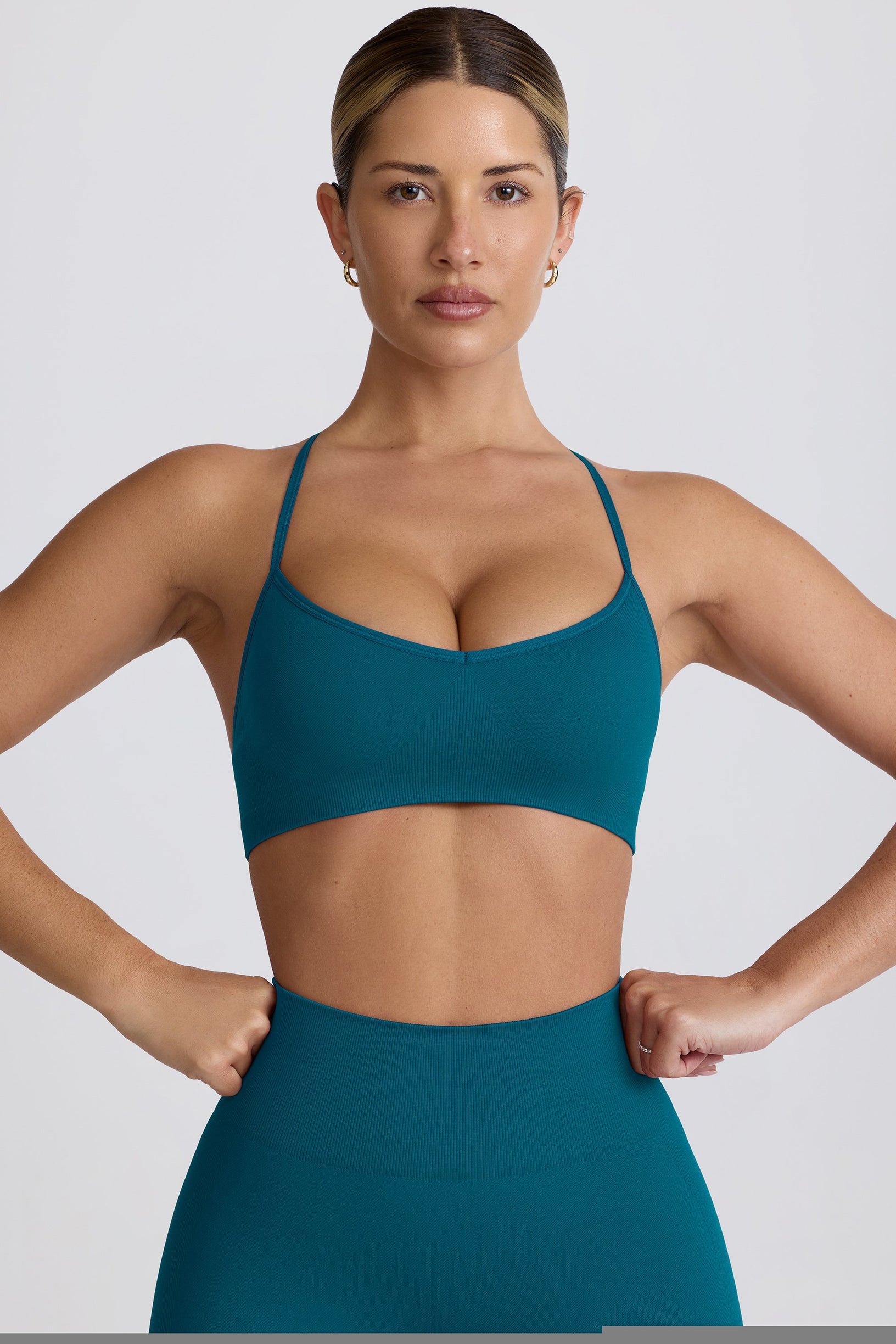 Super Sculpt Seamless Cross-Back Sports Bra in Teal - 2
