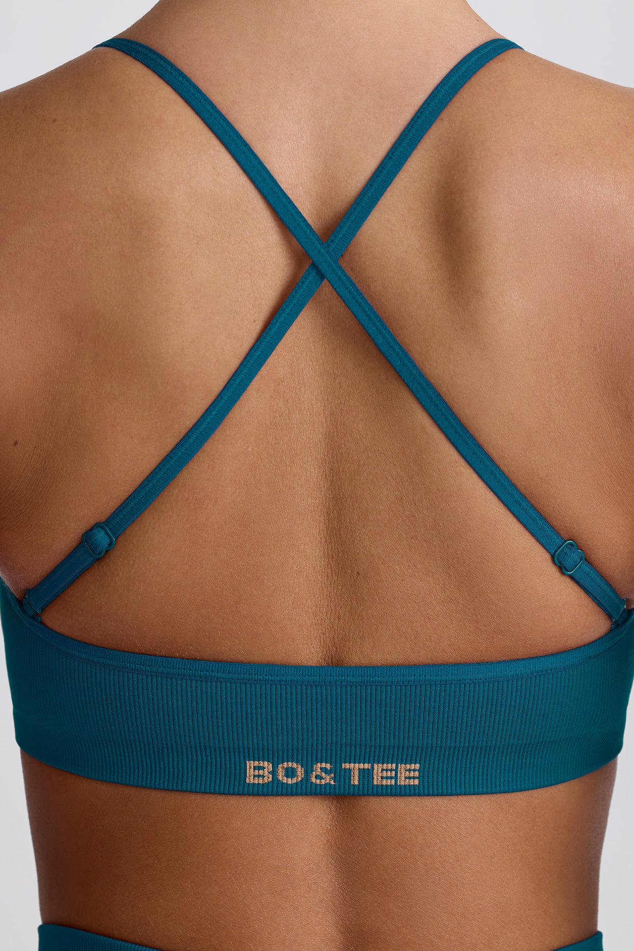 Super Sculpt Seamless Cross-Back Sports Bra in Teal - 7