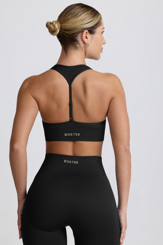 Super Sculpt Seamless T-Back Sports Bra in Black