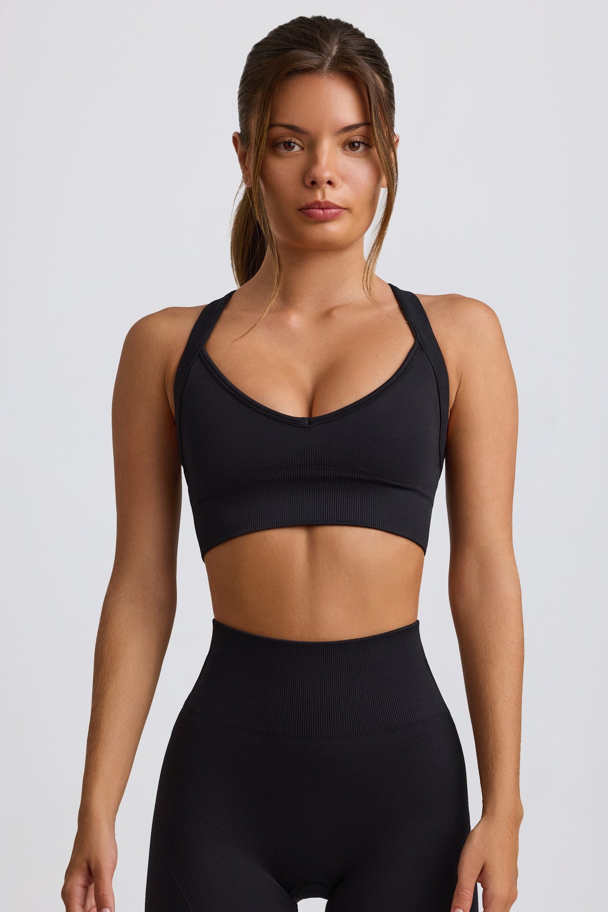 Super Sculpt Seamless Crossback Sports Bra in Black - 1