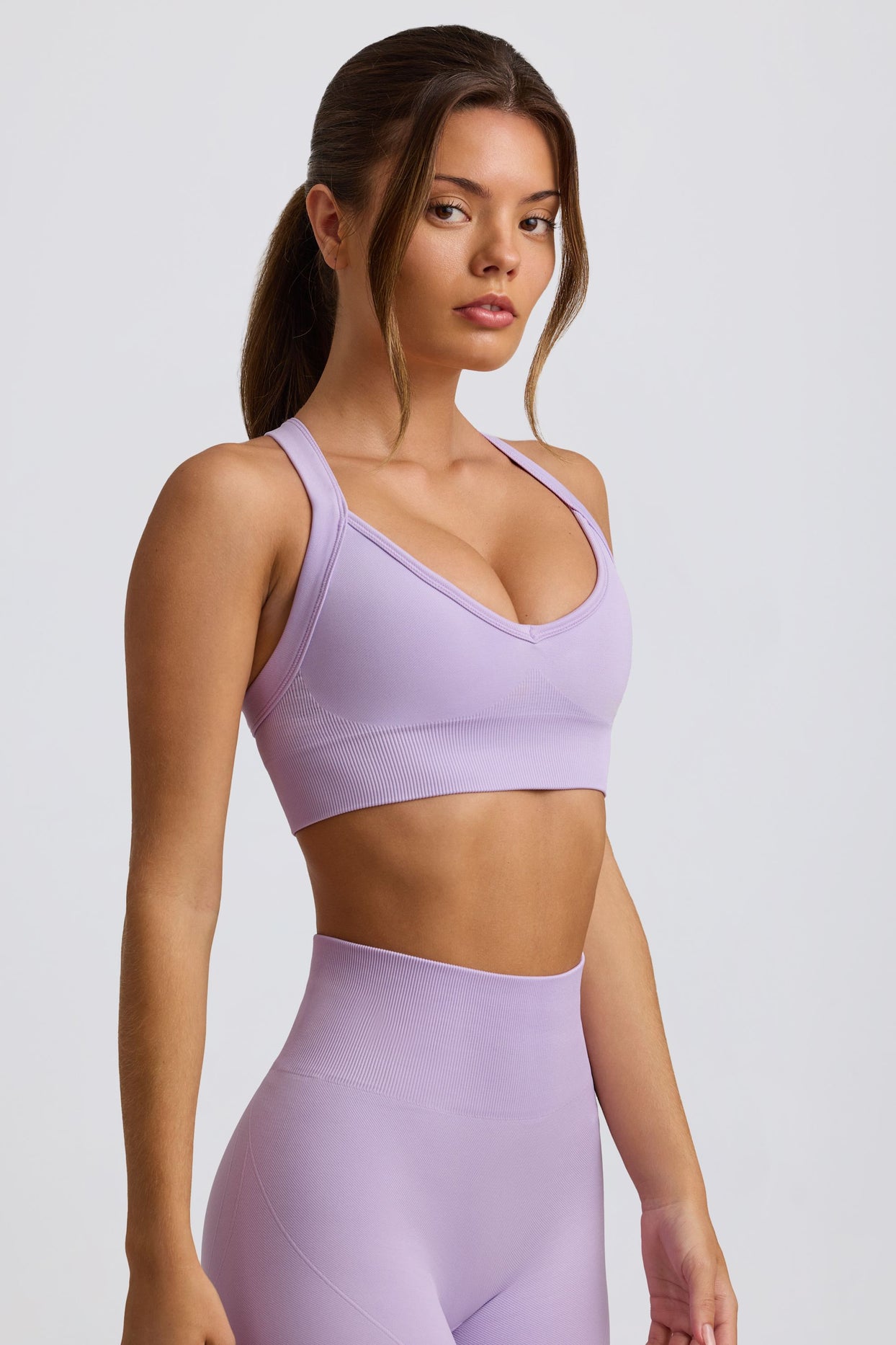 Super Sculpt Seamless Cross-Back Sports Bra in Lavender - 5