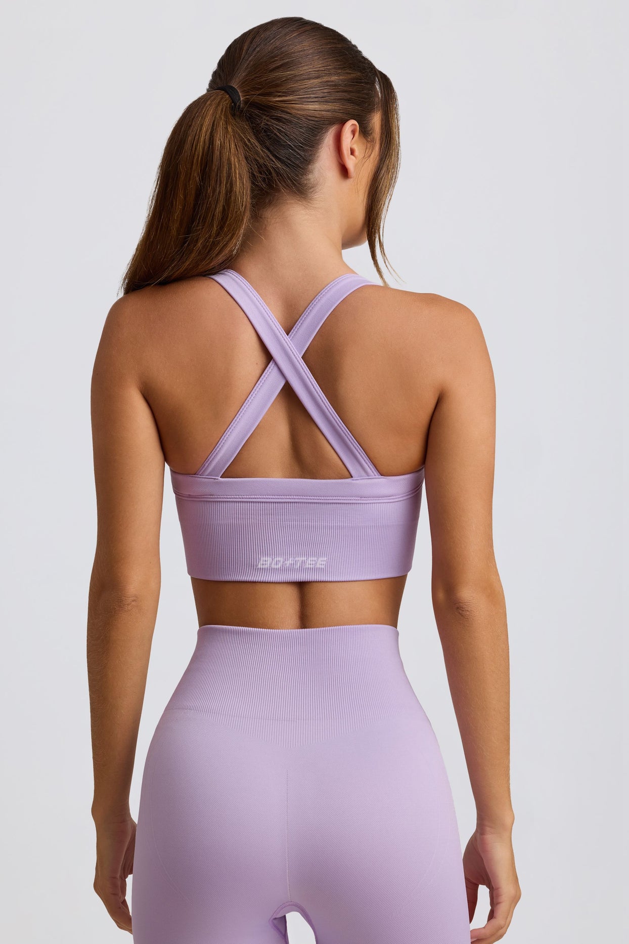 Super Sculpt Seamless Cross-Back Sports Bra in Lavender - 6