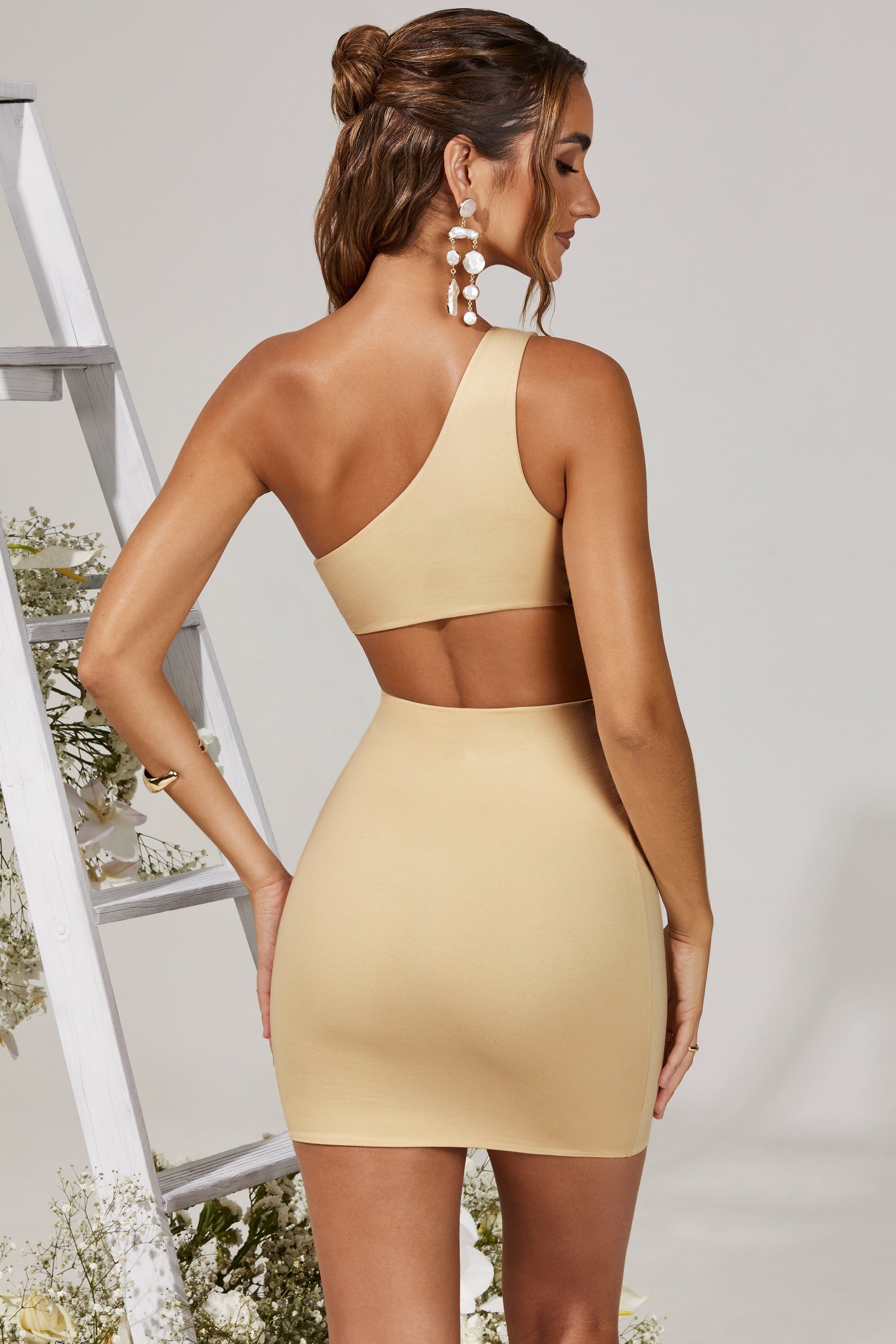 Back view of Orla mini dress in cream