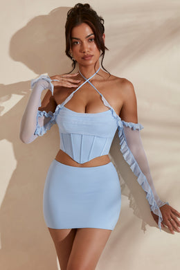 Micro Mini Skirt in light blue with matching crop top.