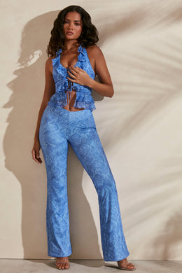 Petite flare trousers in blue print with matching ruffle crop top.