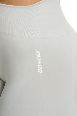 Close up view of grey high waisted leggings