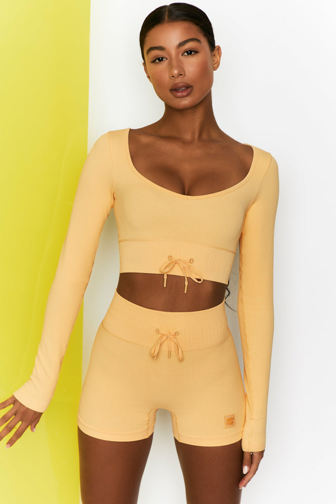 Uncovered Exposed Seam Bardot Crop Top in Beige